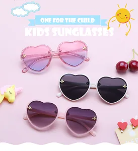Stylish retro heart-shaped kids sunglasses featuring cute bee accents in various colors