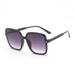 Fashionable oversized square sunglasses with black frame and gradient purple lenses