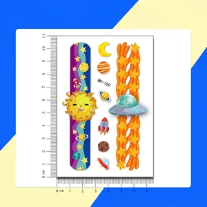 Cartoon watch themed temporary tattoo sheet for kids with cosmic planet and rocket designs