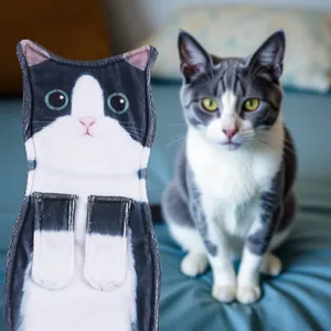 Detail of realistic cat shaped hanging hand towel featuring cute kitten print and soft fabric