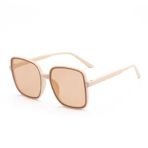 Stylish oversized square sunglasses for women with tan lenses and light beige frame