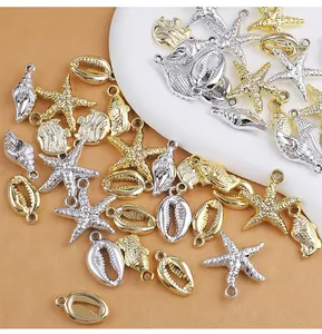 Collection of gold and silver sea shell and starfish charms for DIY handmade jewelry crafts