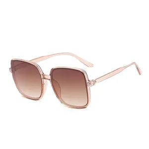 Modern oversized square sunglasses featuring tea gradient lenses and clear frames