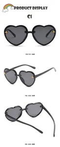 Detail views showing heart-shaped children's sunglasses with gold bee accents and black frames
