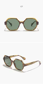 Hexagonal tiger-stripe frame sunglasses with green lenses shown in front and side views