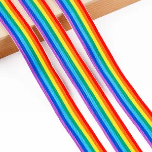 Detailed macro view of vibrant six-color rainbow striped polyester woven ribbon straps