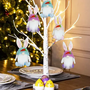 Adorable Easter bunny gnomes plush ornaments hanging on a white decorative tree
