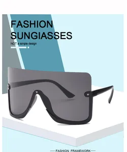 Detailed view of oversized unisex shield sunglasses with star accents and black frames.