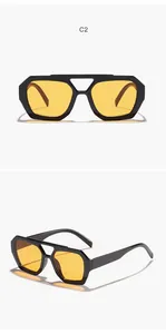 Detailed view of retro irregular sunglasses with double bridge and yellow lenses.