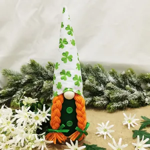 Detail of a St. Patrick's Day gnome doll with shamrock hat and orange braids.