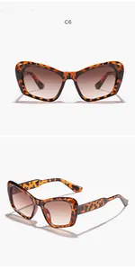 Vistas frontal y lateral de gafas de sol cat-eye de gran tamaño con montura de carey