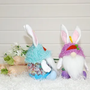Handmade Easter gnome bunny dolls with clear candy jar and checkered fabric carrots.