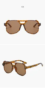 Front and side views of oversized tortoiseshell aviator sunglasses with brown lenses.