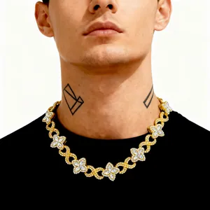 Luxury iced out four-leaf clover and infinity symbol Cuban link necklace on male model