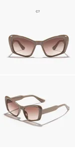 Gafas de sol de ojo de gato marrones extragrandes con lentes degradadas y montura