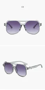 Detail showing pilot sunglasses with purple gradient lenses and double bridge design.
