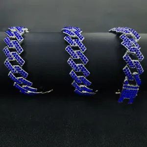 Close-up of 15mm blue rhinestone-encrusted Cuban link chain with rhombus links