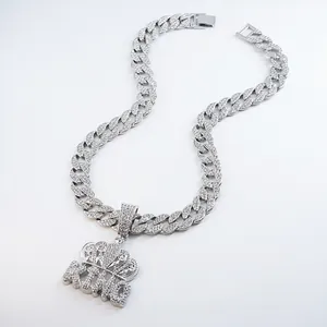 Iced out silver cuban link chain with King crown pendant hip hop jewelry detail view