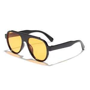 Modern oversized aviator sunglasses with black frame and yellow lenses for men