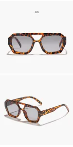 Close-up of bohemian style irregular sunglasses with tortoise frame and double bridge.