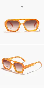 Detail views of retro irregular double-bridge sunglasses with orange patterned frames