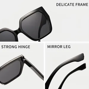 Chic oversized cat eye sunglasses with durable metal hinges and sleek black frames