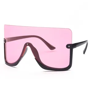Oversized pink shield sunglasses with black frame and star hinge accents
