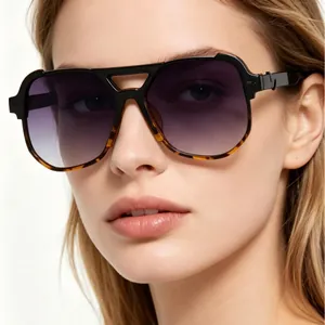 Oversized aviator sunglasses with double bridge and purple gradient lenses for UV protection.
