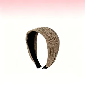 Close-up detail of the 7cm wide pleated vintage headband showing fine fabric texture