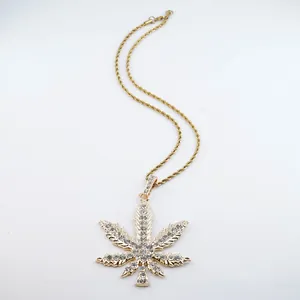 Iced-out gold-plated cannabis leaf pendant necklace with rhinestones for hip-hop fashion