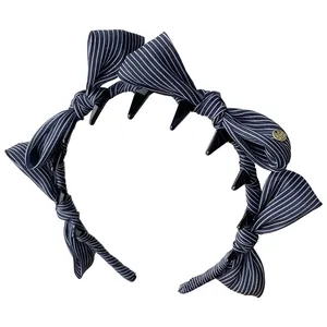 Eleganter vintage marineblau gestreifter Haarreif mit Schleife und praktischen Zähnen