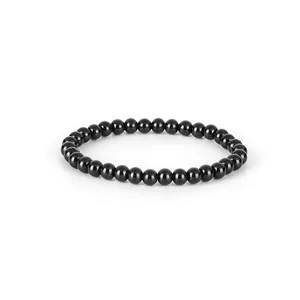 Professional studio shot of a minimalist polished black beaded titanium steel bracelet