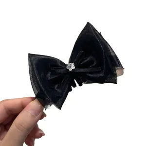 Elegant black sheer organza bow hair claw clip with crystal flower detail for women