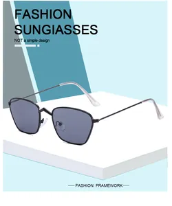 Detailed view of stylish retro irregular metal frame sunglasses with grey lenses
