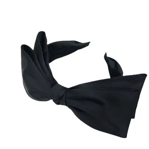 Korean style elegant black satin headband with a large decorative bow for stylish hair