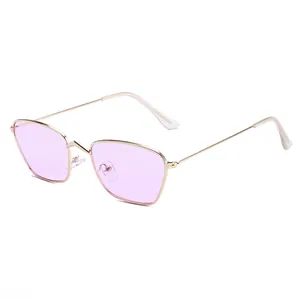 Retro irregular gold metal frame sunglasses featuring light purple tinted lenses