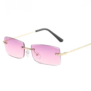 Occhiali da sole rimless ultra leggeri con lenti sfumate rosa e stanghette dorate