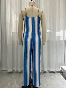 Back view of a blue and white vertical striped cami jumpsuit on a mannequin