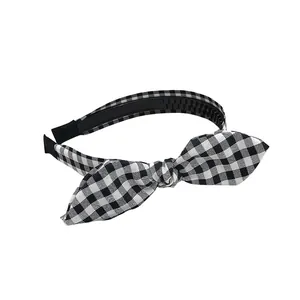 Classic black and white gingham headband with a cute bow knot design for women