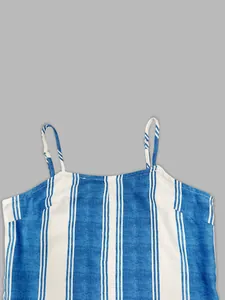 Macro detail of elegant blue and white vertical striped camisole top with adjustable straps