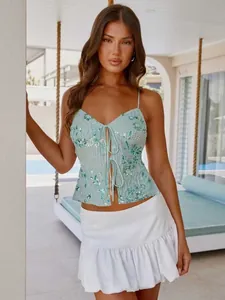 Sexy mint green sequin camisole top with deep V-neck and tie-front detail.