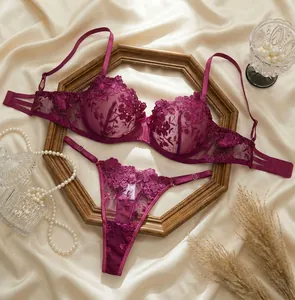 Detailed view of the intricate rose embroidery on the sheer lace lingerie set