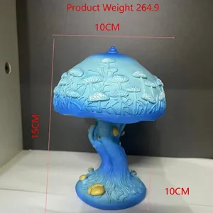 Detail van een blauwe paddenstoel tafellamp met afmetingen en gewichtsparameters