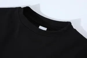 Close-up detail of a premium black 230g heavy cotton crew neck long sleeve t-shirt