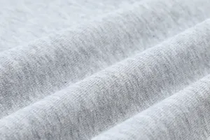 Close-up detail of 230g heather grey jersey fabric texture on a women's t-shirt