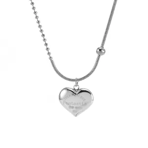 Asymmetrical titanium steel necklace with heart pendant, bead and snake chain design