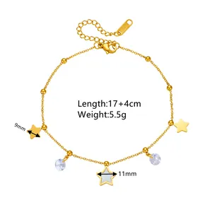 Detail showing gold-plated stainless steel anklet with white shell star and crystal charms