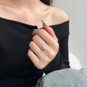 Elegant S925 sterling silver ring with large ice-flower cut zircon on model's hand