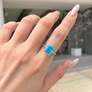 Close-up detail of a stunning radiant-cut blue gemstone ring in S925 sterling silver