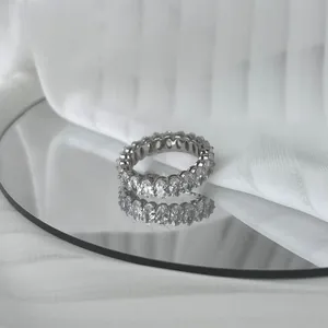 Close-up of S925 silver ring with sparkling white zirconia in a full eternity design